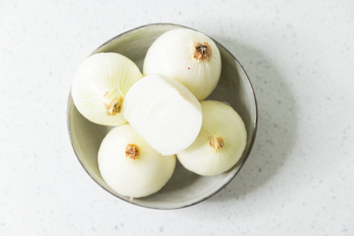Pealed onions in a bowl