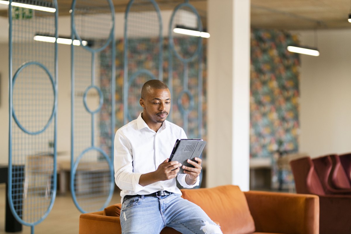 Black man looking at ipad