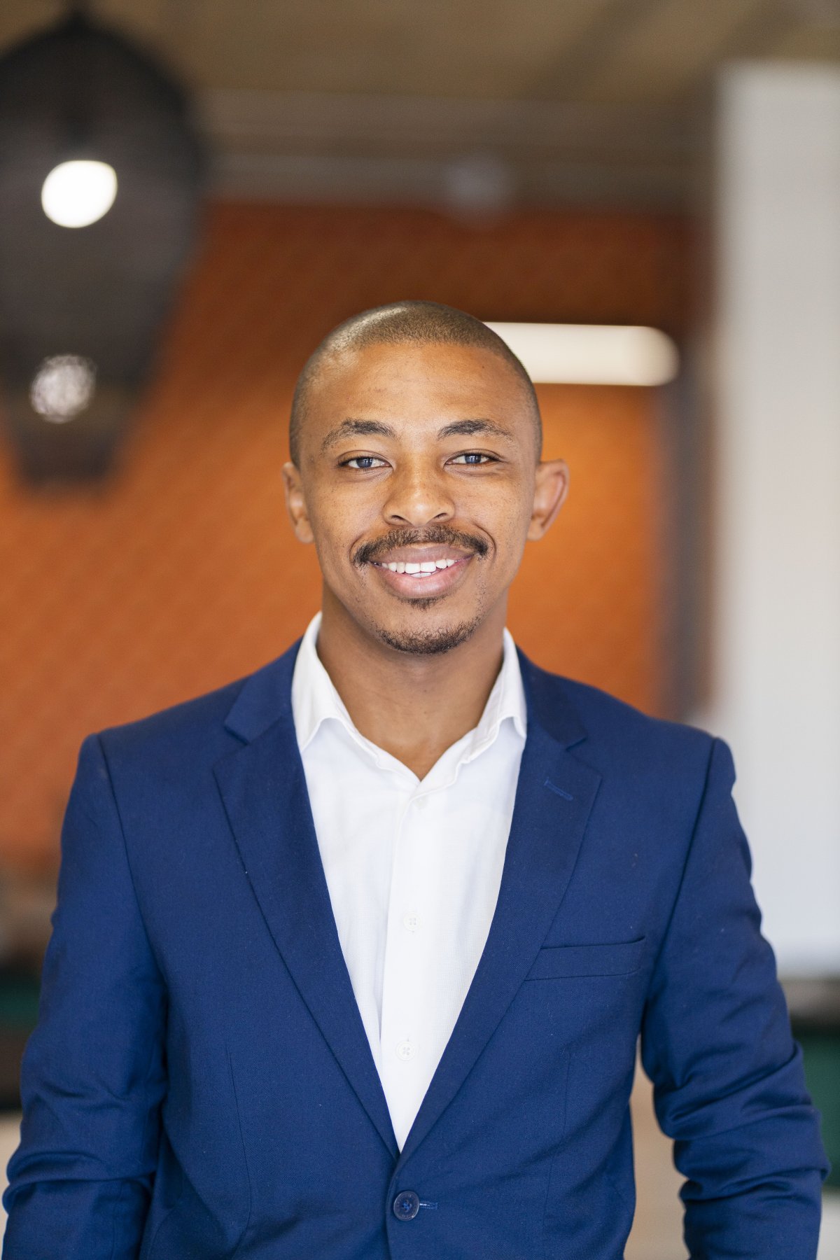 Black business man profile photo