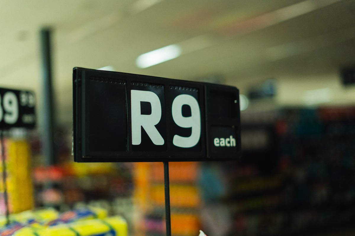 R9 each sign at a retail store
