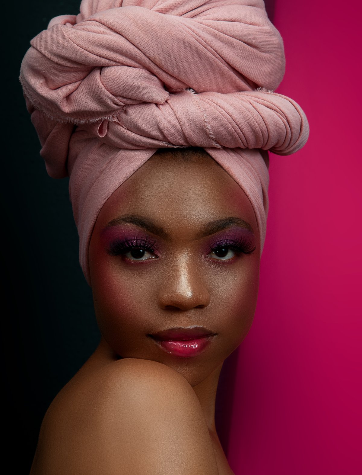 Black model looking at camera