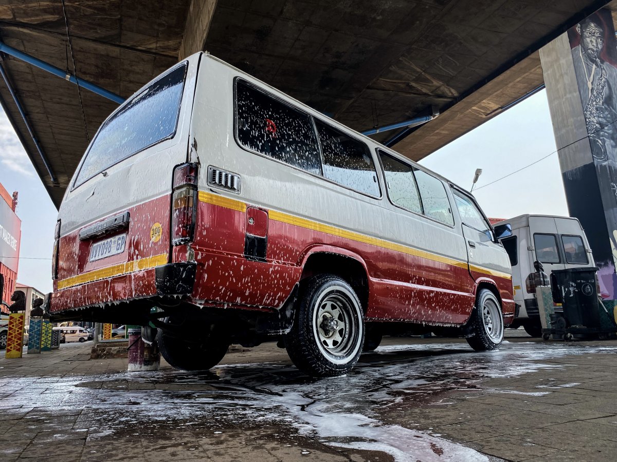 Super 16 taxi parked to get washed