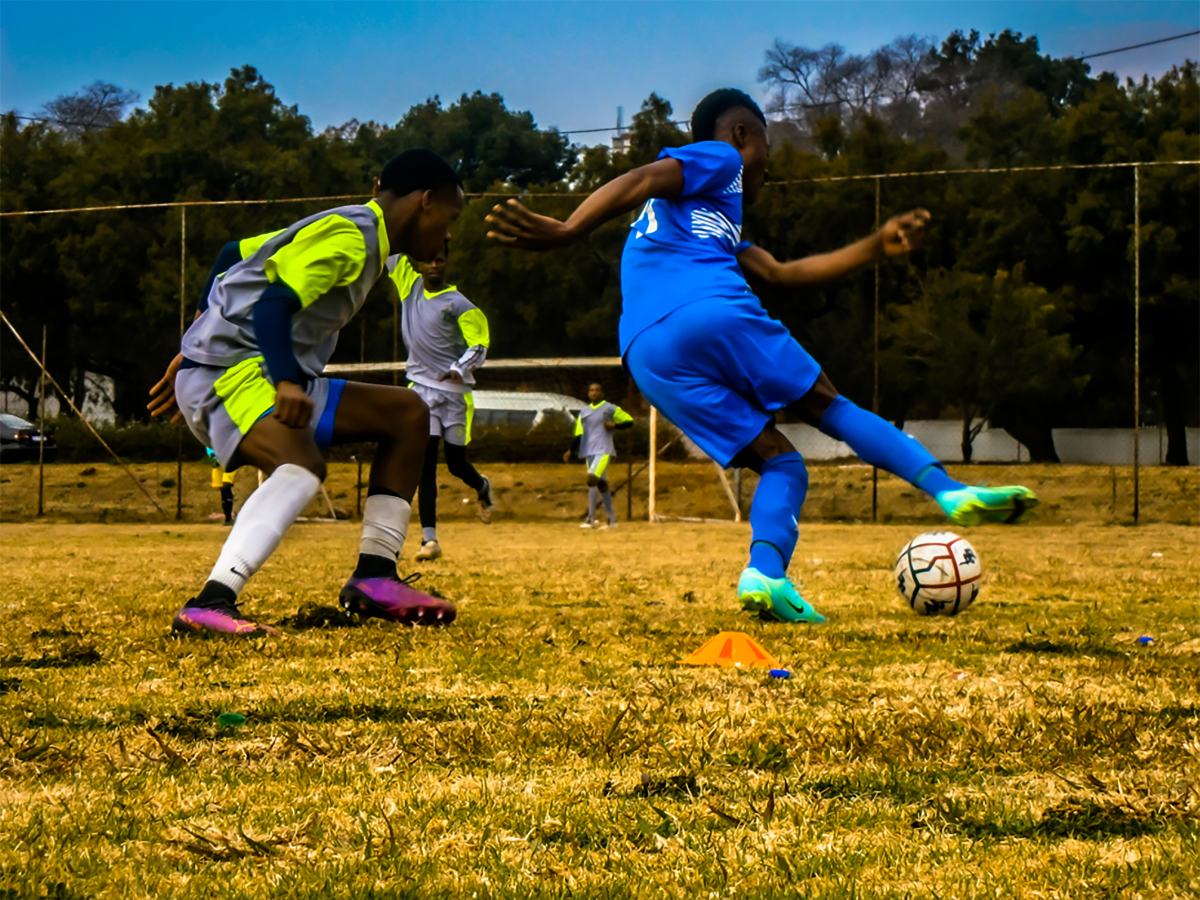 Soccer Player Dribbling