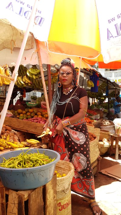 African woman at a fruit market