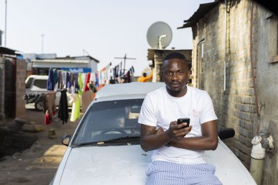 Holding a smartphone in Alex