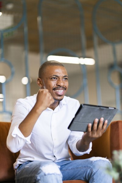 Black man looking at ipad