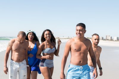 Friends at the beach having fun