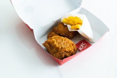 KFC chicken with chips meal.