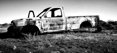 Old run down bakkie with no wheels