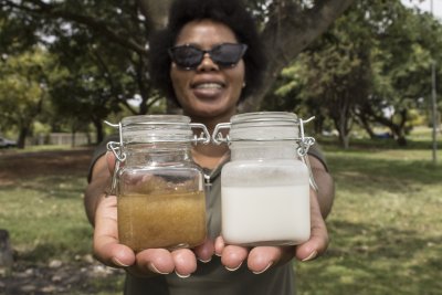 Woman presents cosmetic products on her hands