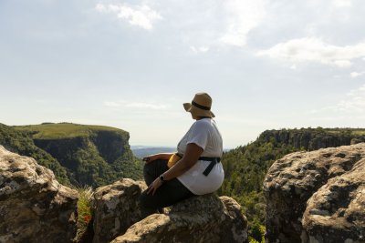 Black woman watching the view of Mpumalanga