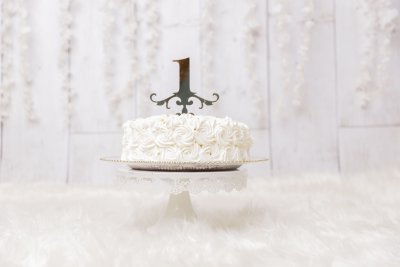 1st birthday cake on a stand