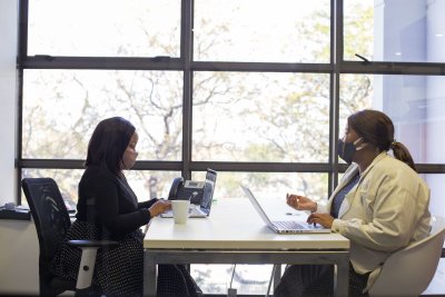 Business women in a meeting during covid-19