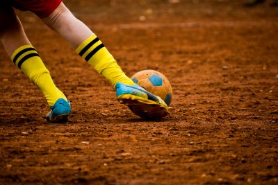 Goal kick in the dust