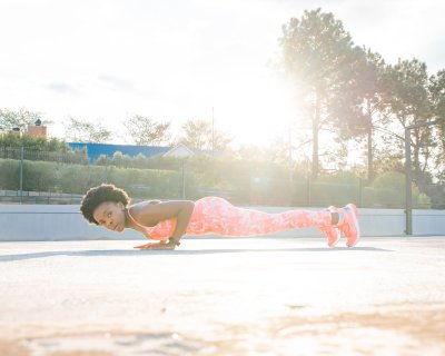 Black athlete doing push-up